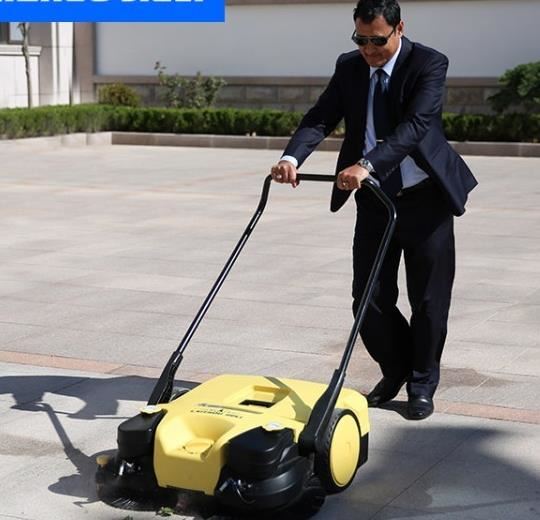 Handheld floor sweeper