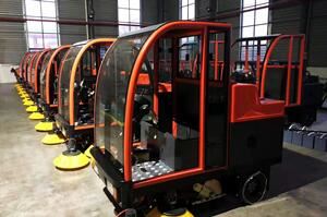 Pivot Cleaning Machinery ride on sweepers in the workshop